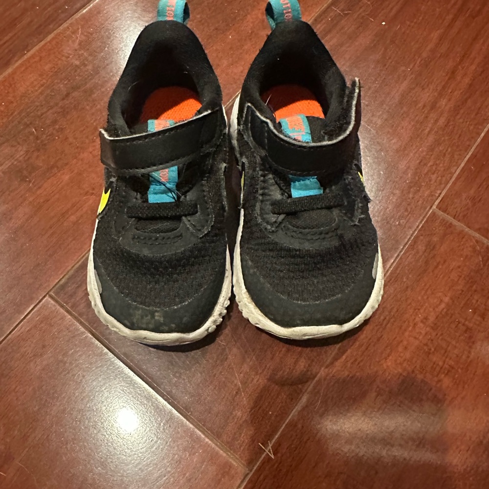 Nike Kids Black Sneakers with Teal and Orange Accents